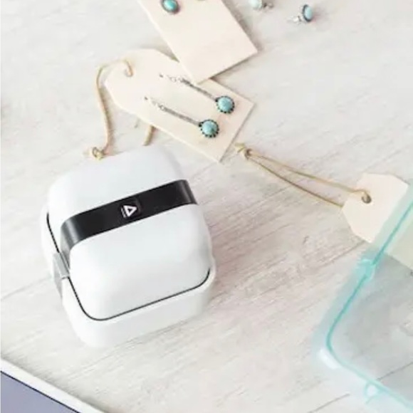 Mini printer. 
Glide, print, and make DIY designs with this handheld PrintMaker. - Picture 6 of 13